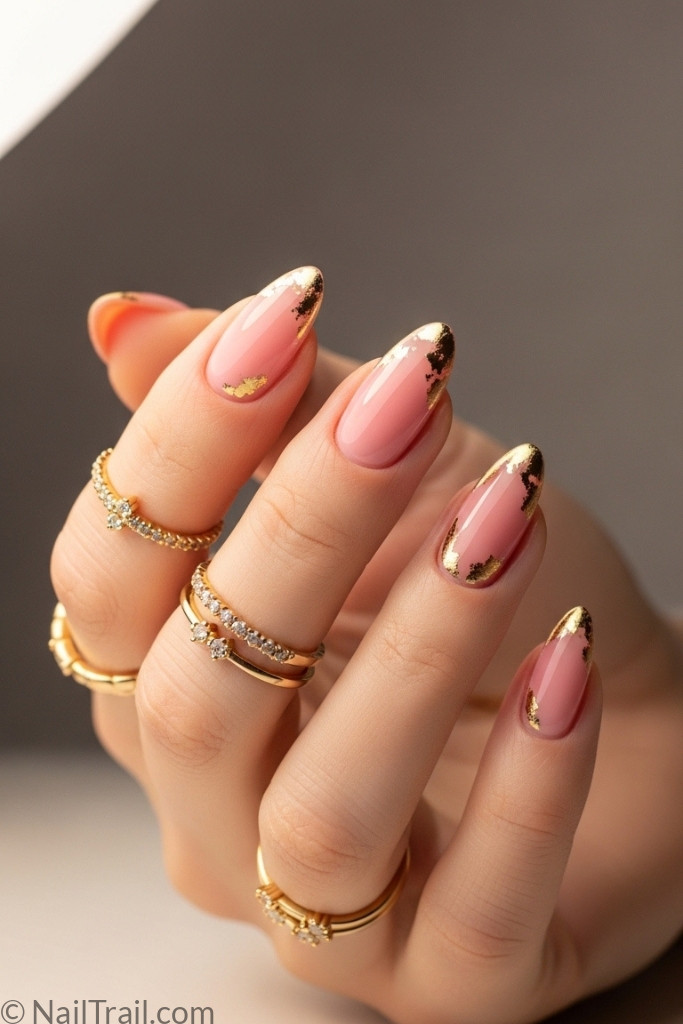Almond nail shape manicure with pink polish