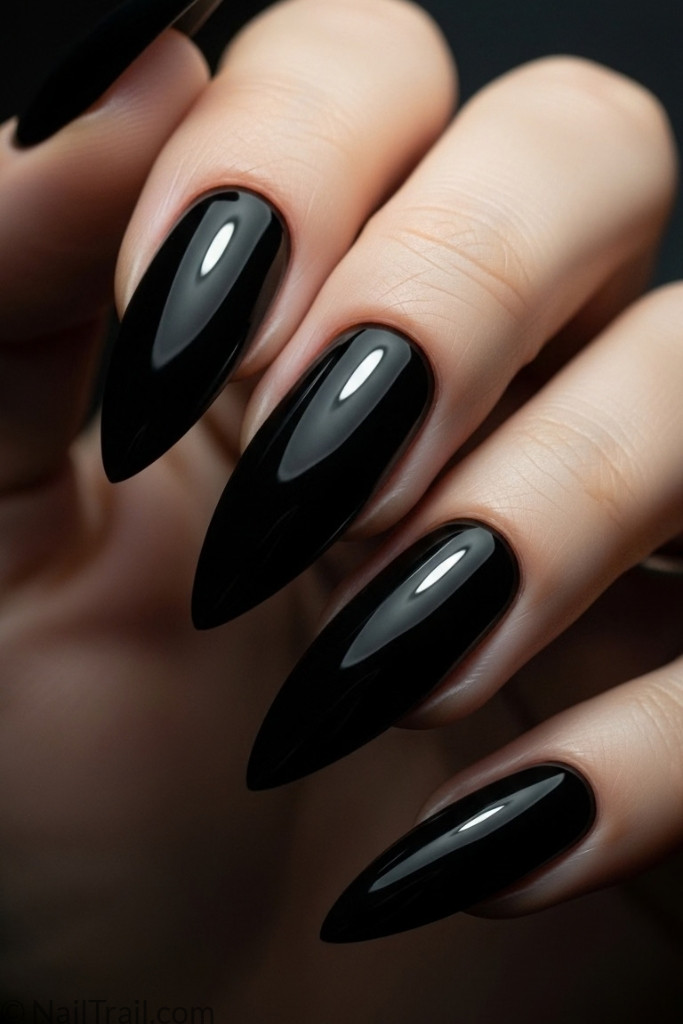 Arrowhead nail shape with black polish