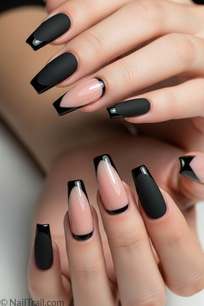 Coffin-shaped black French tip nails with nude base and mixed finish