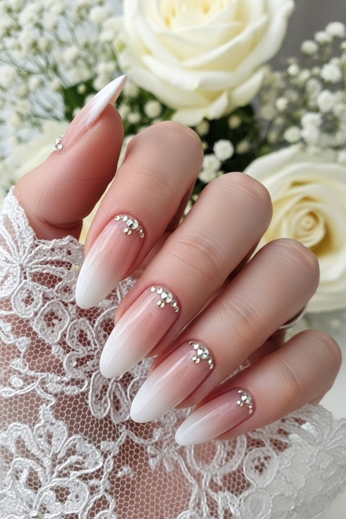 French ombre acrylic nails with nude to white gradient for weddings