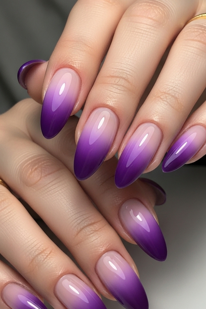 Gradient purple ombre nails from light lavender to deep violet
