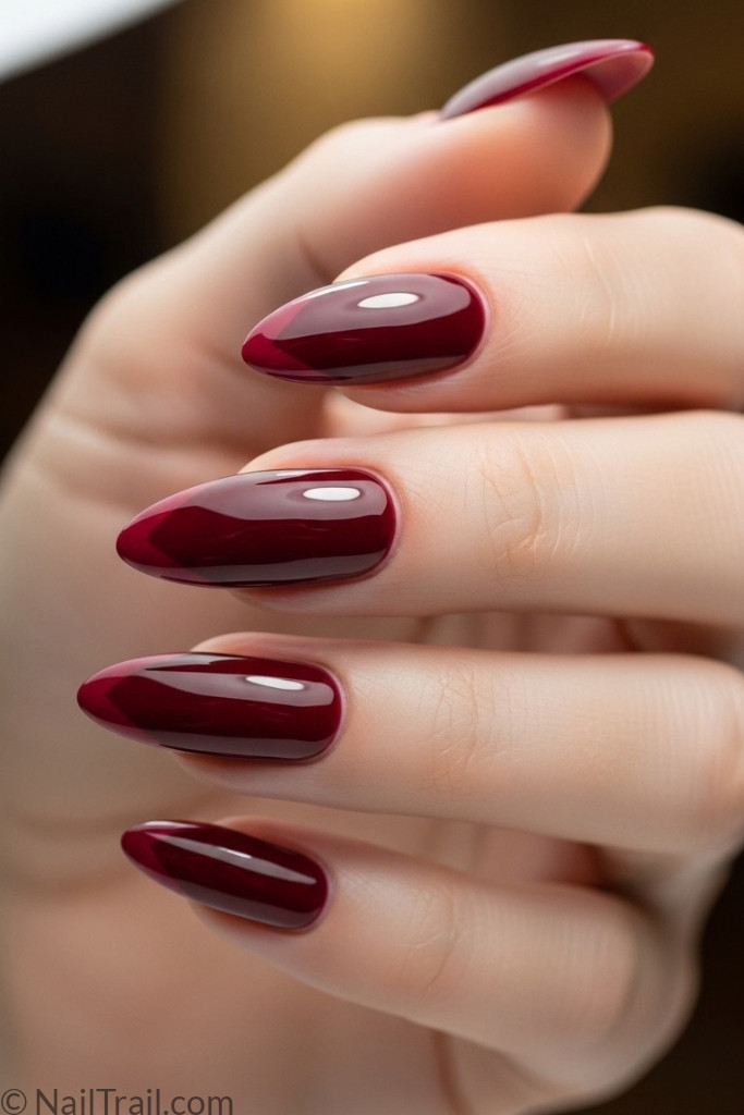 Lipstick nail shape with burgundy polish