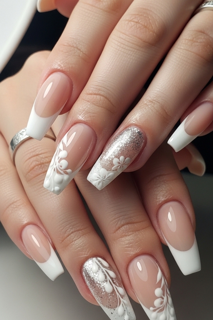 Long French manicure acrylic nails with nude base and white tips