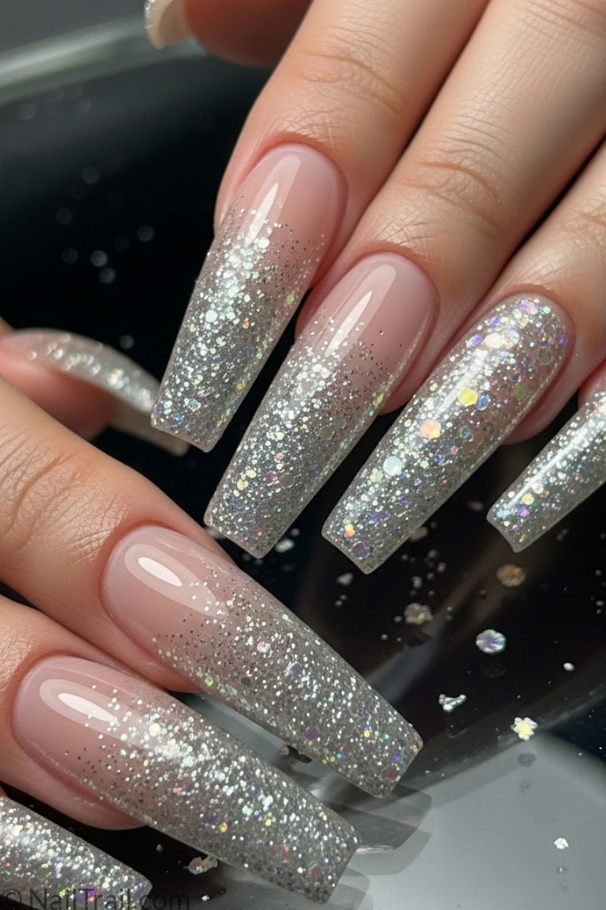 Long coffin nail shape with glitter manicure