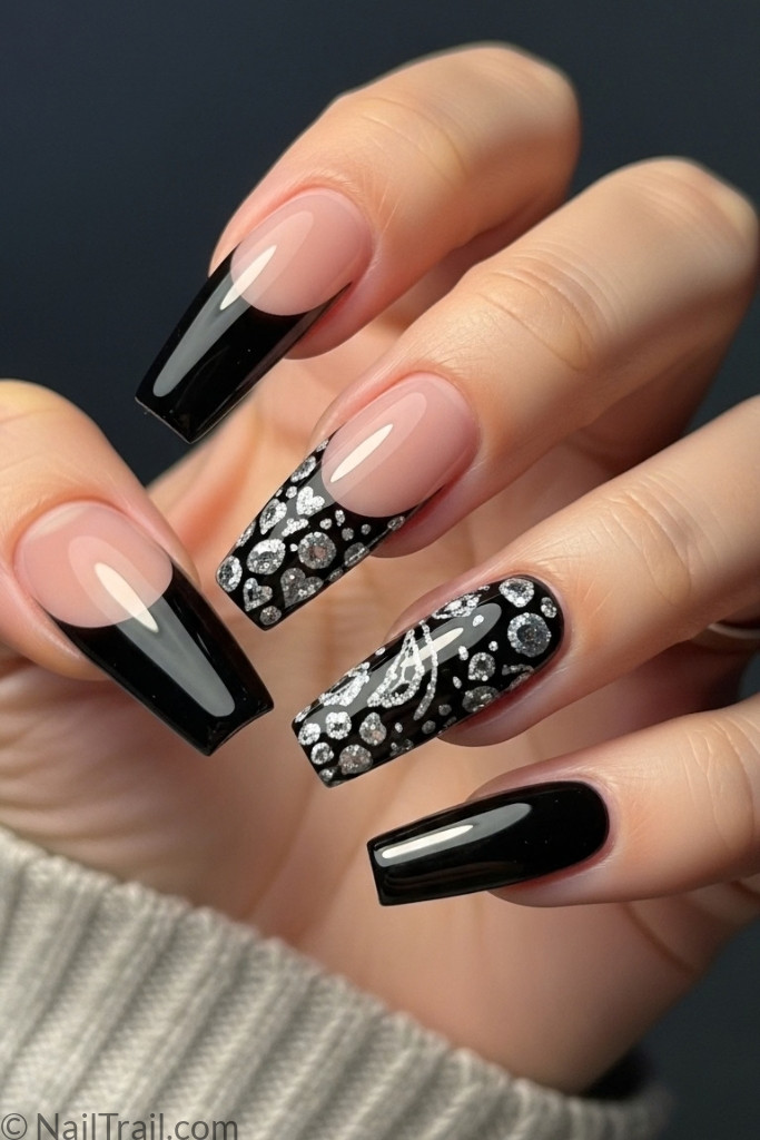 Long coffin-shaped black French tip nails with glossy finish