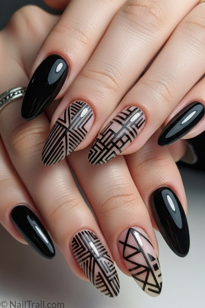 Medium-length trendy black French tip nails with geometric patterns