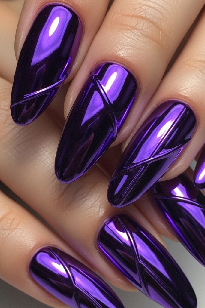Metallic purple chrome nails with geometric accents