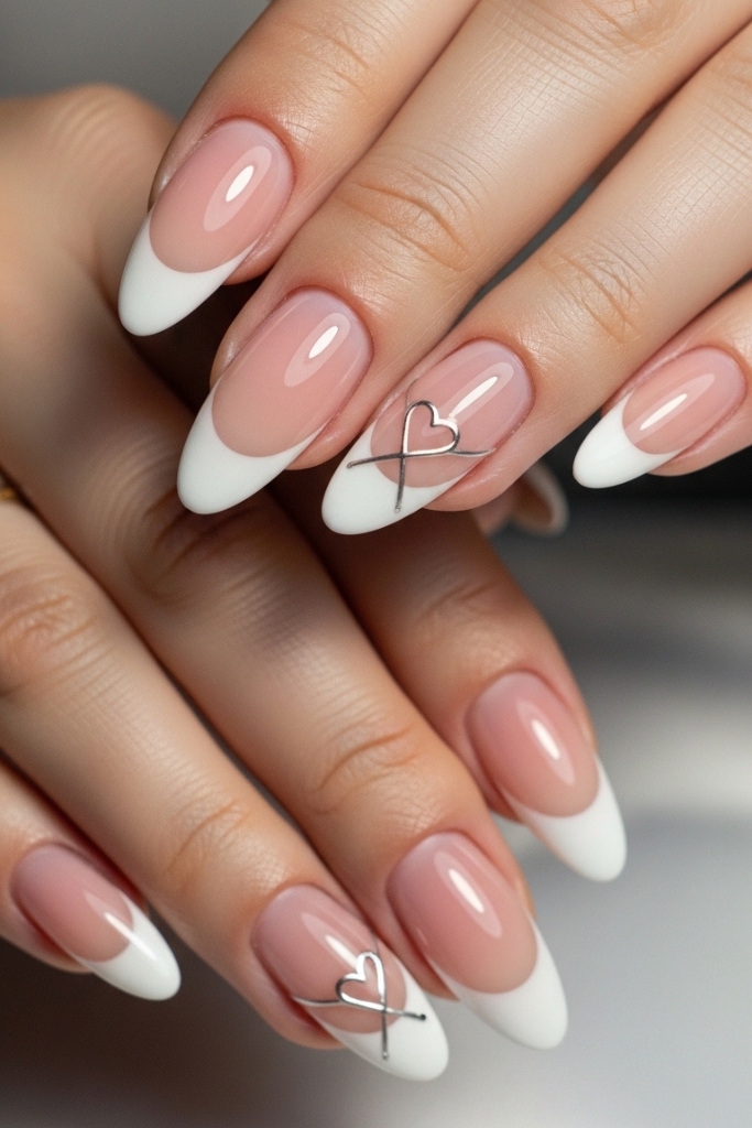 Minimalist French manicure acrylic nails with nude base and white tips