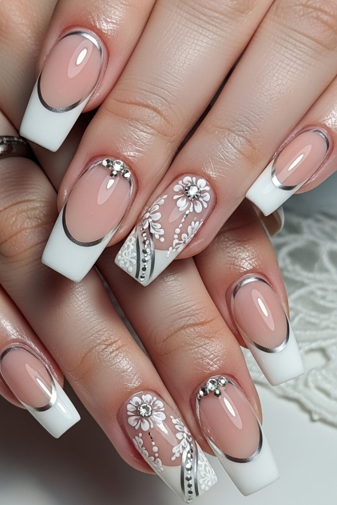 Modern French manicure acrylic nails with coffin shape and metallic accents