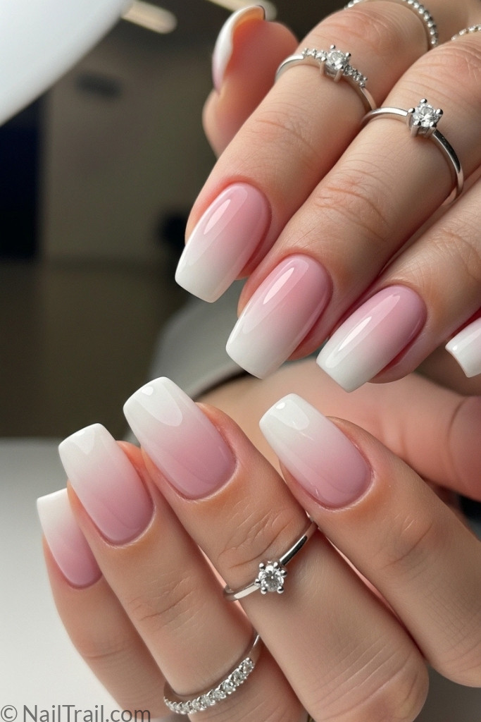 Ombre gradient nail manicure with pink fade