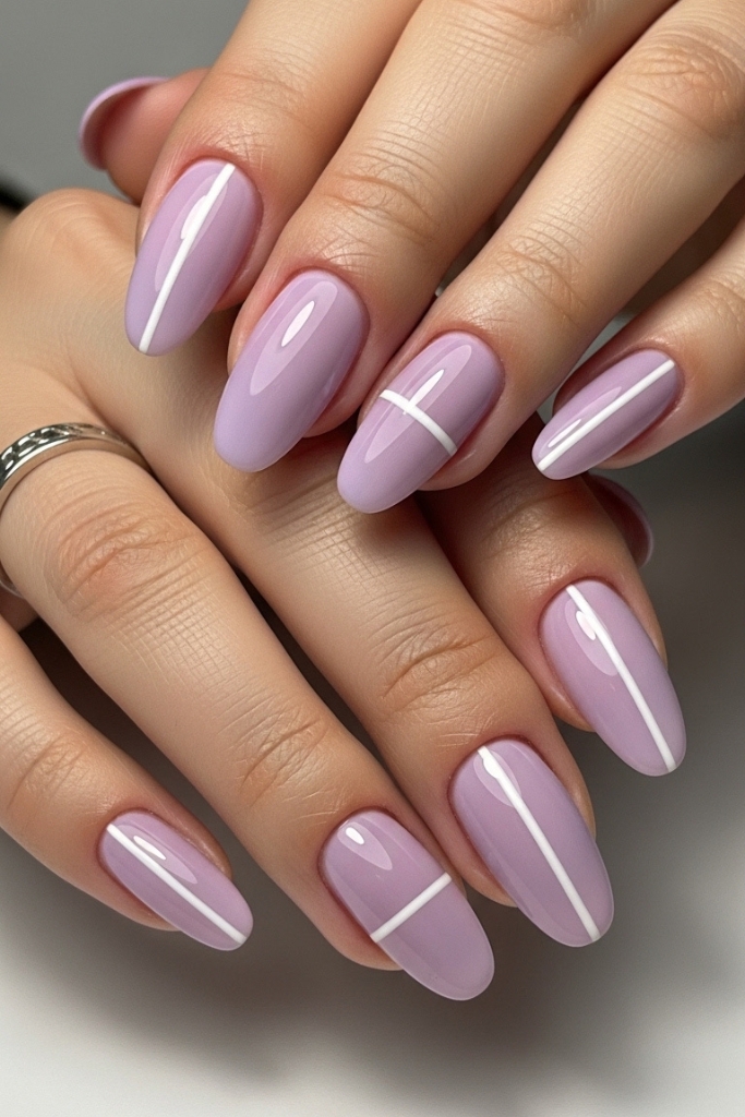 Short minimalist purple nails with delicate white lines