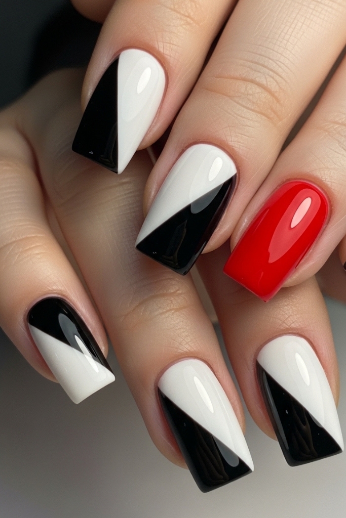Black and white split villain nail design