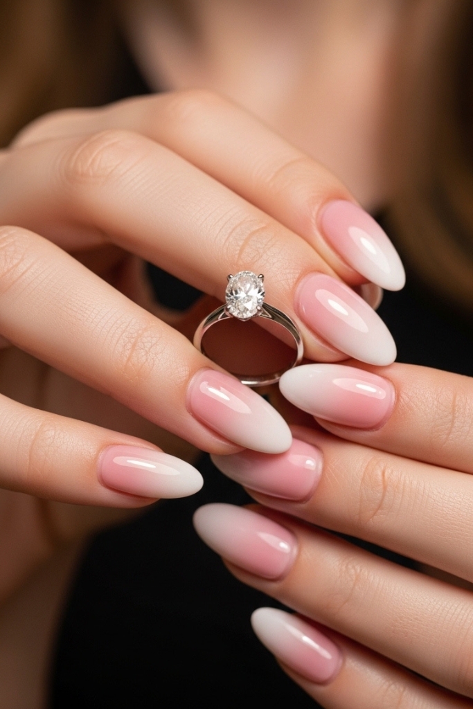 Ombre engagement nails with oval diamond ring