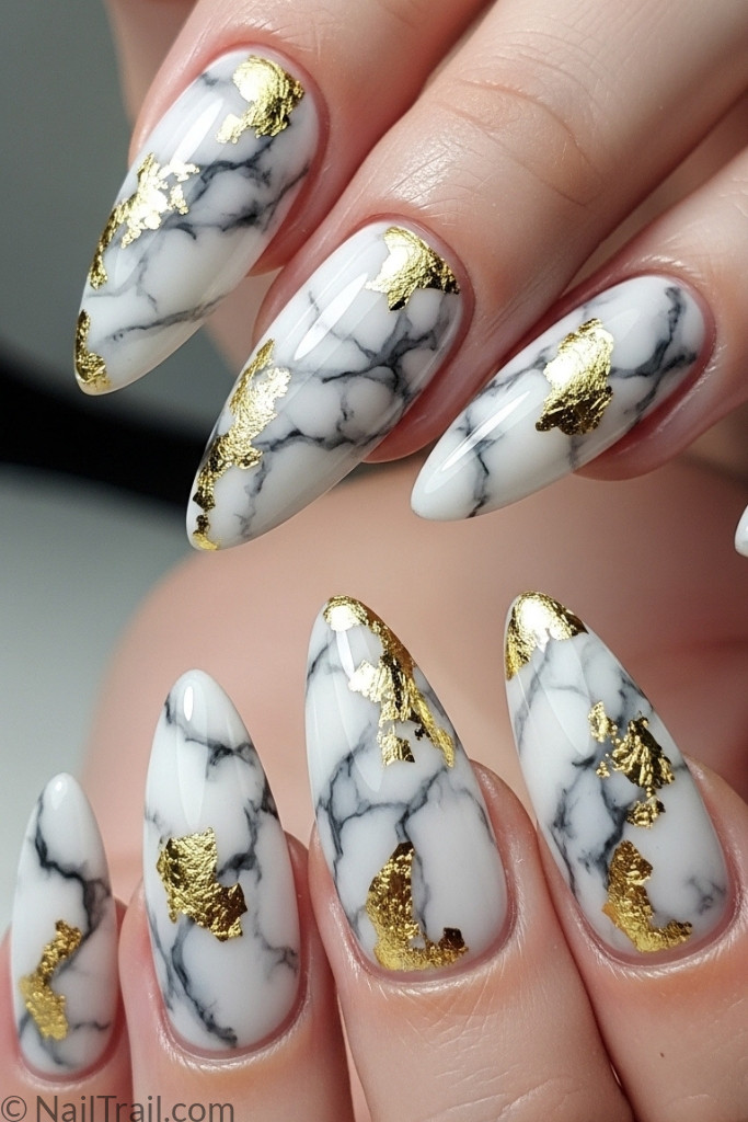 White and gray marble nails with gold leaf details