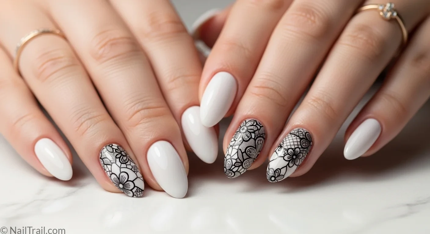 Fair neutral hands with white almond nails black lace pattern art lace nails feature