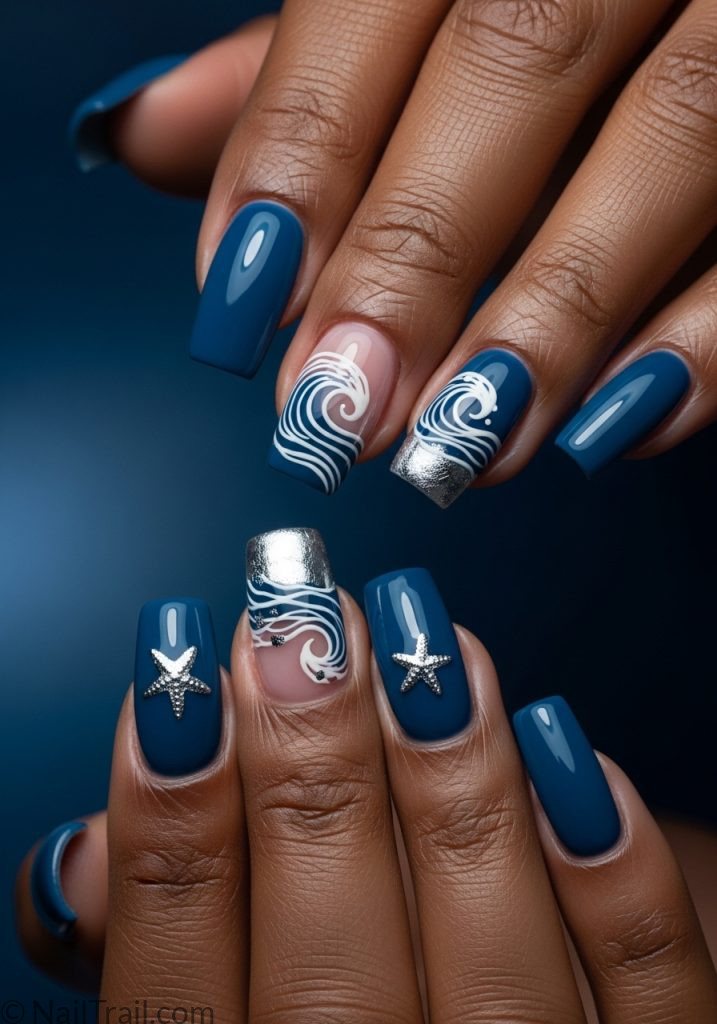 Ocean blue gel square nails with white wave art on dark hands