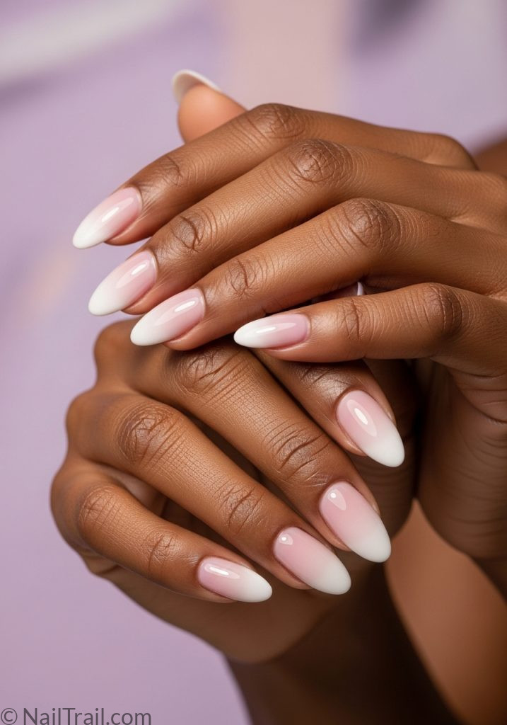 Dark skin hands with lilac white ombre almond nails spring nail ideas almond simple designs