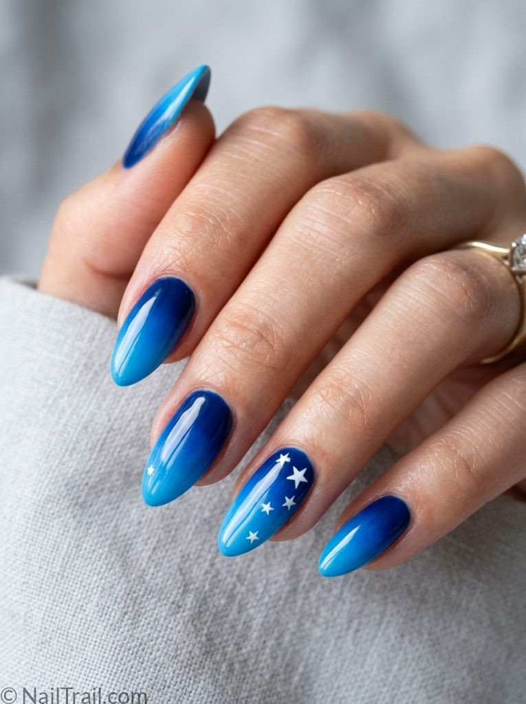 blue ombre 4th of july nails navy sky blue star almond glossy gradient