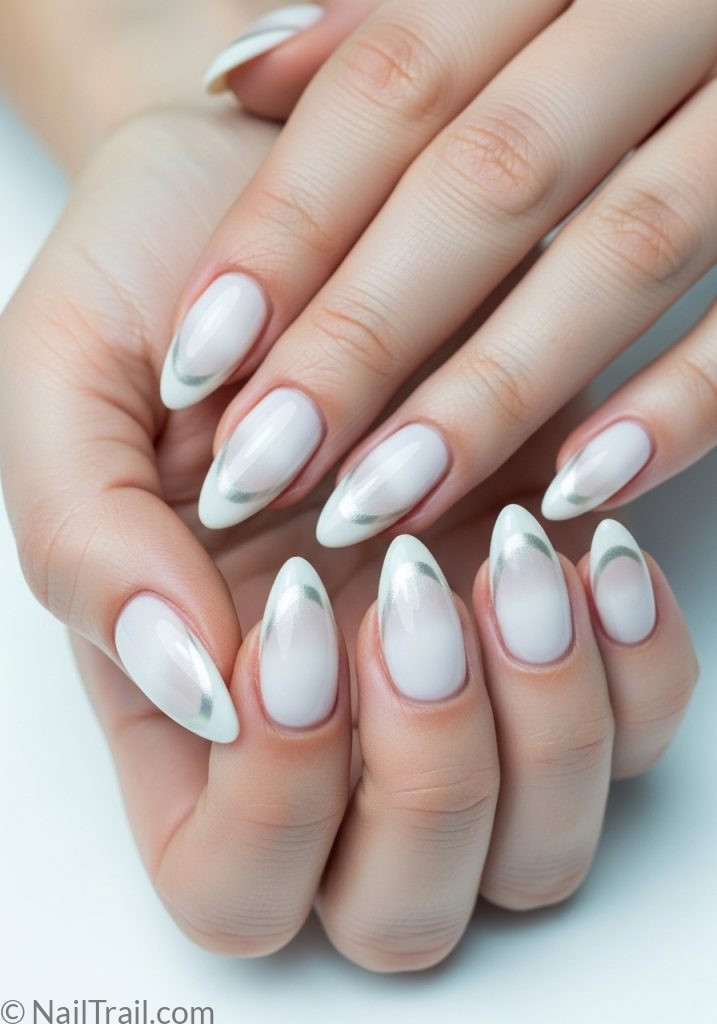 Fair skin hands with milky white almond nails pearlescent cat eye shimmer milky white cat eye nails