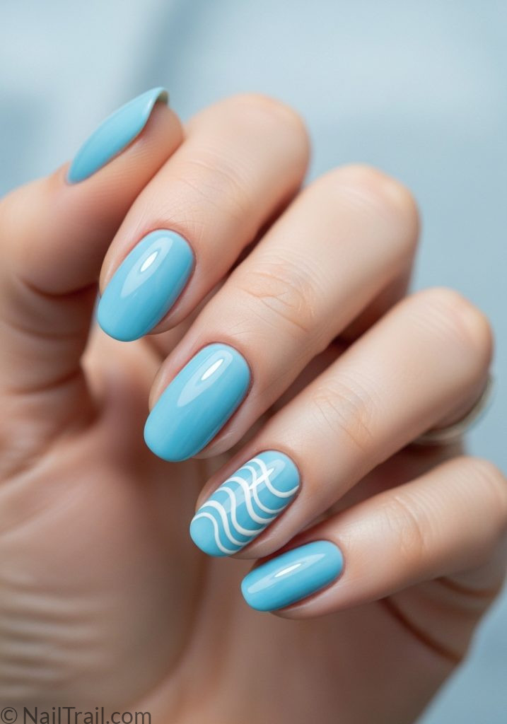 Fair hand with very short blue oval nails white wave art very short summer nails blue beach