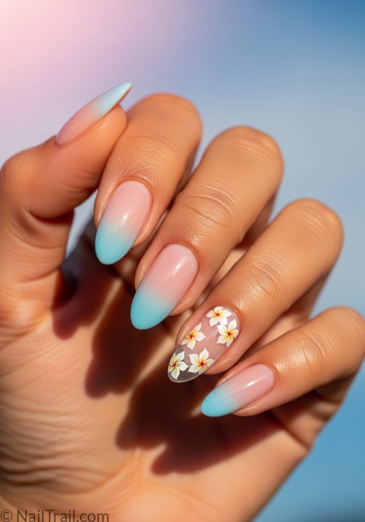 Medium tan hand with pink blue gradient almond nails tropical flower tropical almond nails pink blue