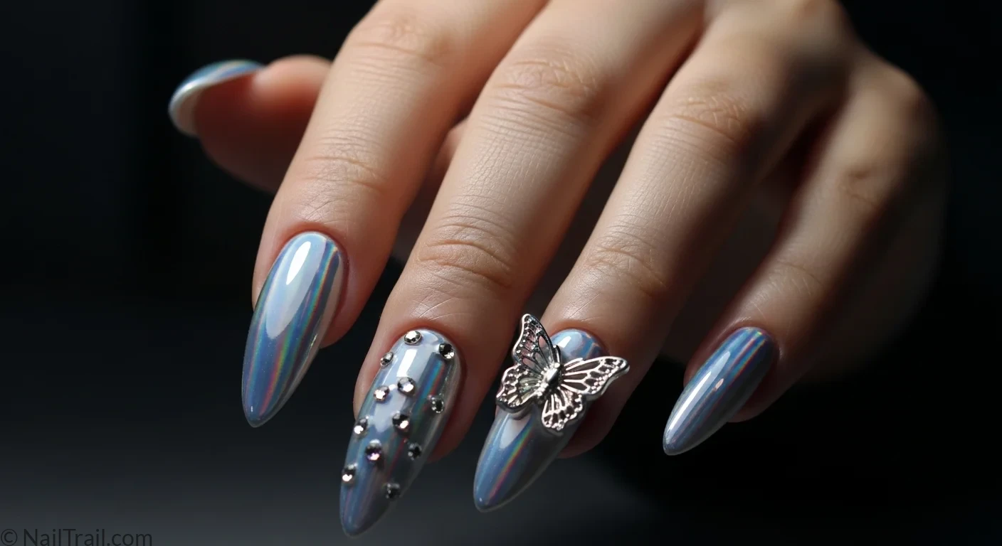 Light tan hand with holographic chrome almond nails butterfly charm star rhinestones y2k nails feature