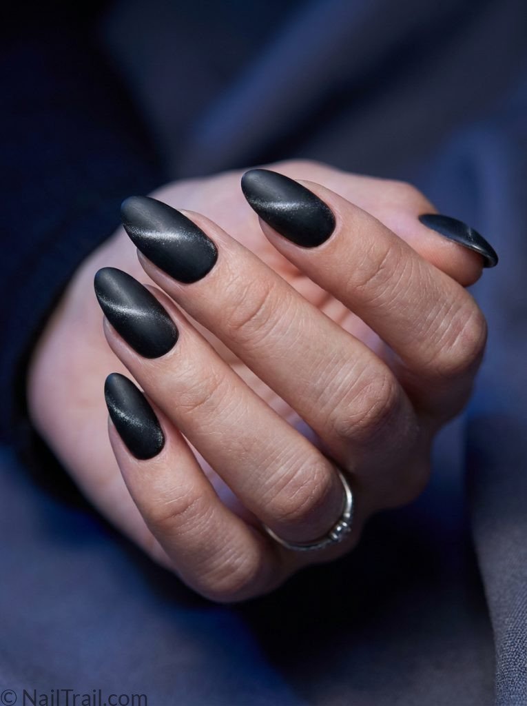 black cat eye summer nails almond silver multidimensional shimmer matte dramatic editorial moody