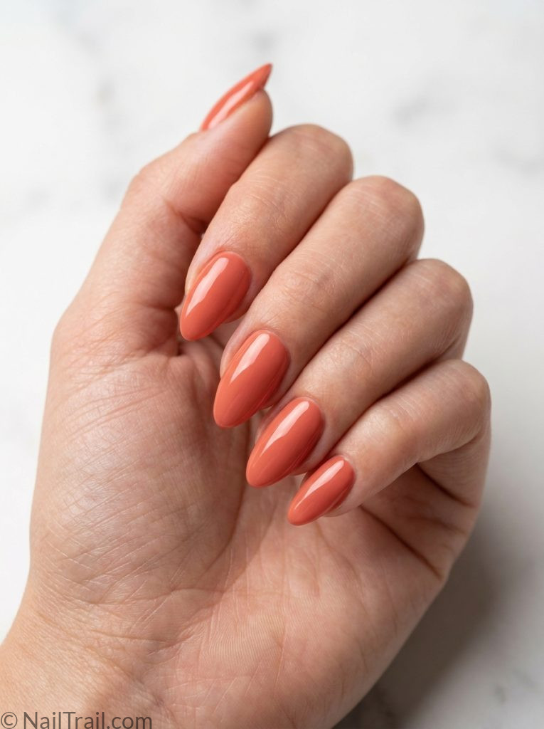 Alt Text: summer nails 2026 trends coral glazed almond high shine glossy warm