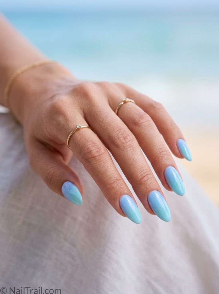 colorful beach nails pastel blue almond glossy airy serene soft summer fresh