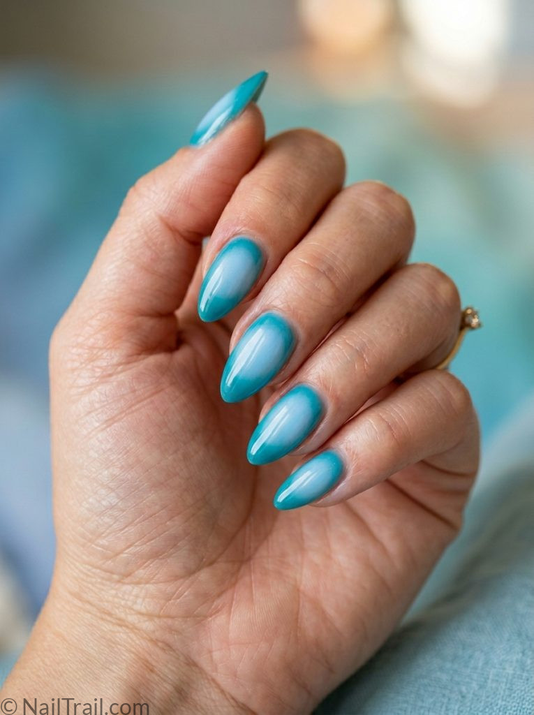 aura summer nails almond blue teal dreamy ocean glow diffused gradient glossy serene