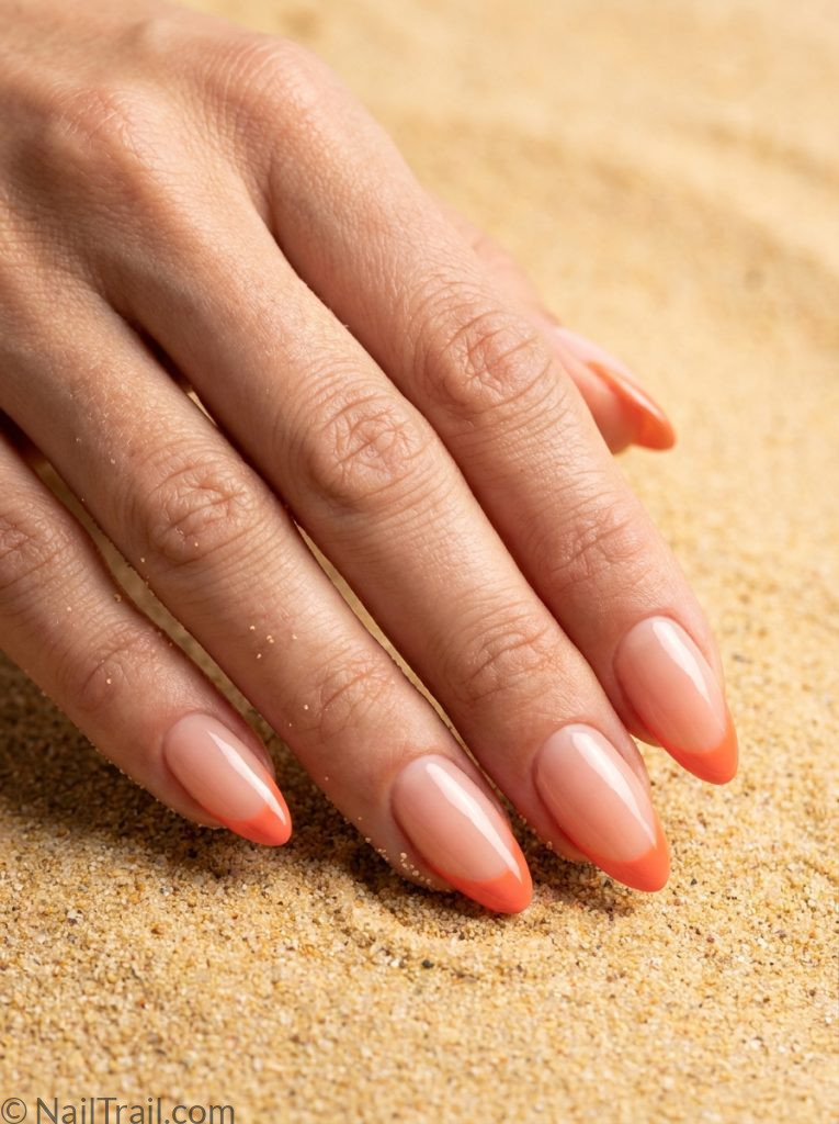 summer french tip nails coral tip almond shape glossy gel finish beach background