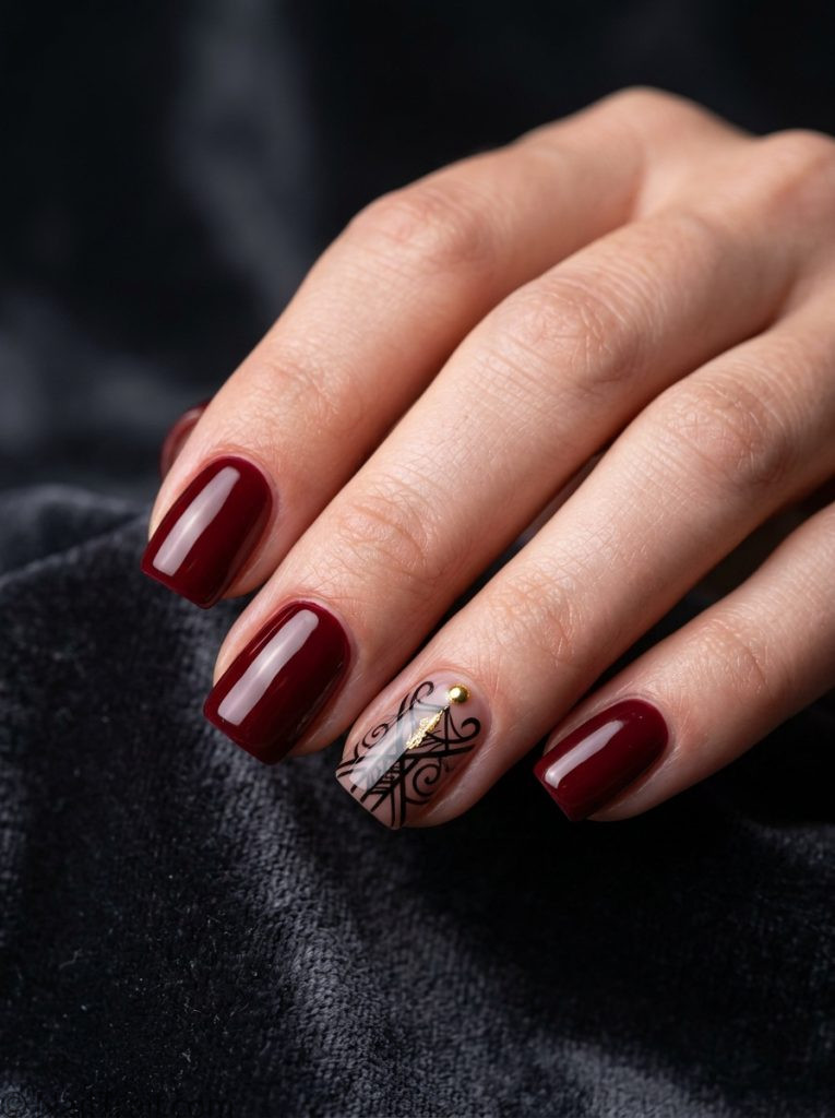 bts nails short square shape deep red black graphic gold accent glossy gel finish dark moody background